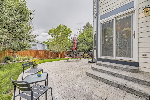8657 Aberdeen Cir, Highlands Ranch, CO 80130 - view of patio with entry steps and outdoor dining area