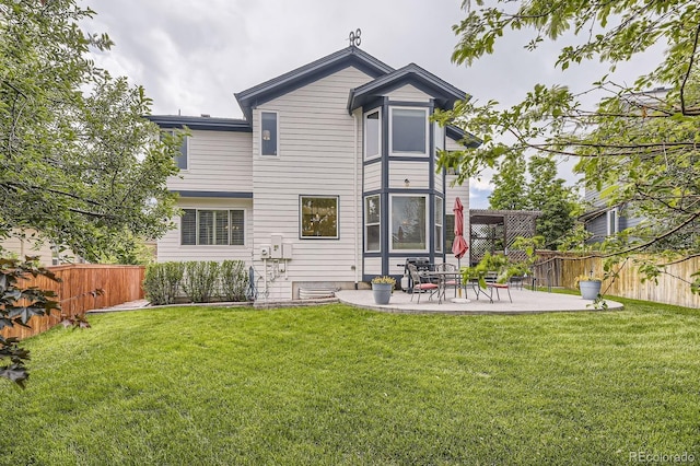 8657 Aberdeen Cir, Highlands Ranch, CO 80130 - rear view of house with a patio area