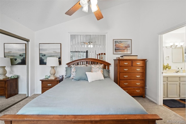 5875 W Asbury Pl, Lakewood, CO 80227 - bedroom featuring lofted ceiling, light carpet, baseboards, ceiling fan, and connected bathroom