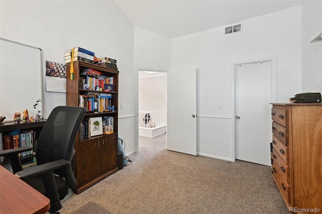 5875 W Asbury Pl, Lakewood, CO 80227 - office area with vaulted ceiling, visible vents, and carpet