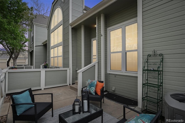 5875 W Asbury Pl, Lakewood, CO 80227 - view of patio / terrace with an outdoor living space