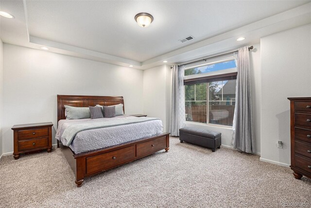 11511 E 118th Ave, Commerce City, CO 80640 - bedroom with light colored carpet, recessed lighting, baseboards, and a raised ceiling