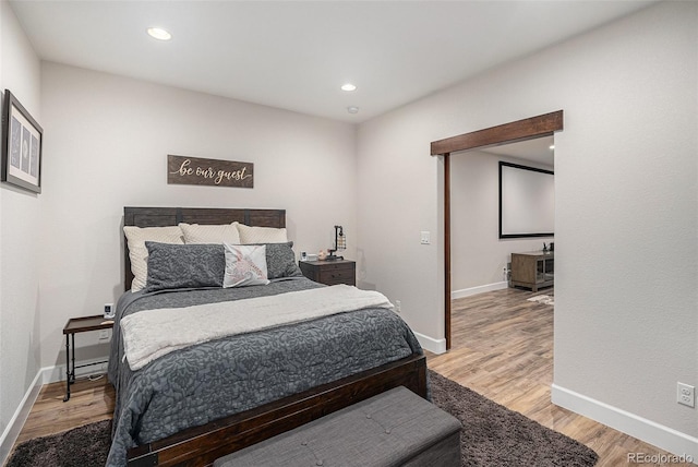 11511 E 118th Ave, Commerce City, CO 80640 - bedroom with light wood-style flooring, baseboards, and recessed lighting