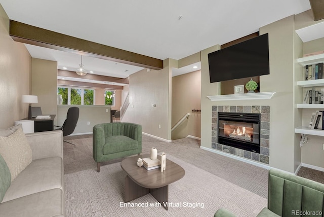2943 W Riverwalk Cir Unit I, Littleton, CO 80123 - carpeted living area with a tiled fireplace, beamed ceiling, built in features, and recessed lighting