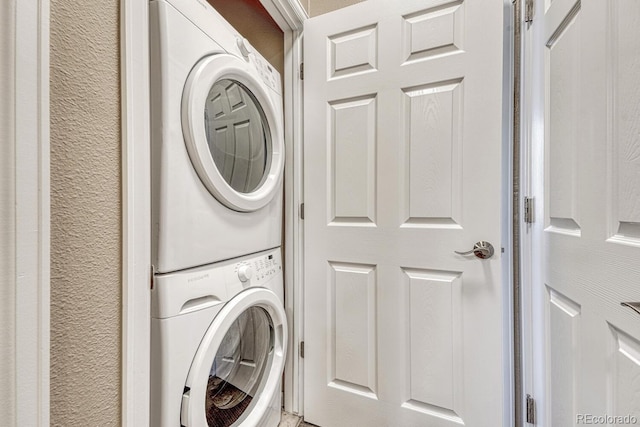 2943 W Riverwalk Cir Unit I, Littleton, CO 80123 - laundry room with stacked washer and clothes dryer