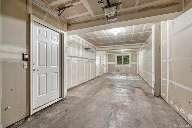 2943 W Riverwalk Cir Unit I, Littleton, CO 80123 - garage featuring a garage door opener