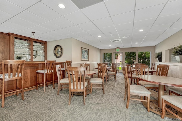 2943 W Riverwalk Cir Unit I, Littleton, CO 80123 - dining room featuring recessed lighting, a dry bar, and a paneled ceiling