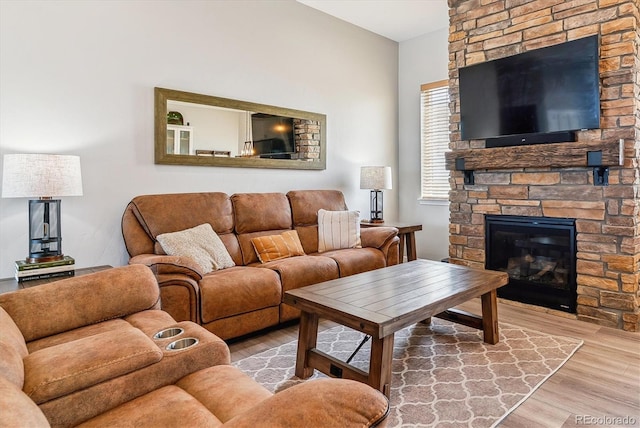 527 Antelope Dr E, Bennett, CO 80102 - living room with wood finished floors and a fireplace