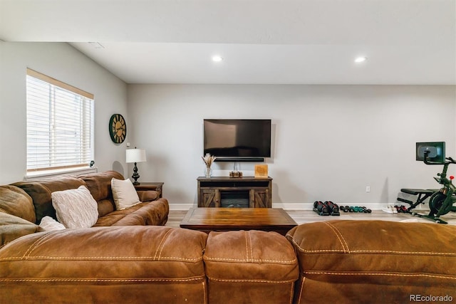 527 Antelope Dr E, Bennett, CO 80102 - living room with baseboards and recessed lighting
