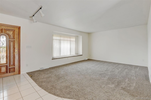 11310 W Center Ave, Lakewood, CO 80226 - carpeted foyer entrance with rail lighting and tile patterned flooring