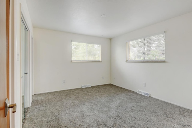 11310 W Center Ave, Lakewood, CO 80226 - unfurnished bedroom featuring carpet and baseboards