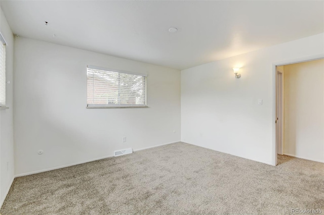 11310 W Center Ave, Lakewood, CO 80226 - spare room featuring carpet and baseboards