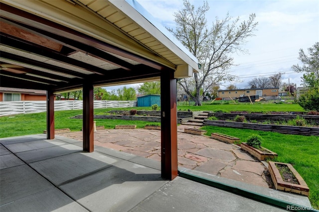 11310 W Center Ave, Lakewood, CO 80226 - view of patio / terrace featuring a vegetable garden