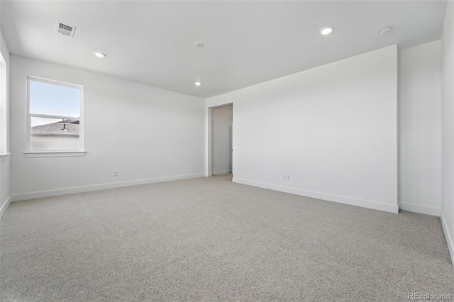 16565 Black Rose Cir, Parker, CO 80134 - spare room with light colored carpet, baseboards, recessed lighting, and a smoke detector