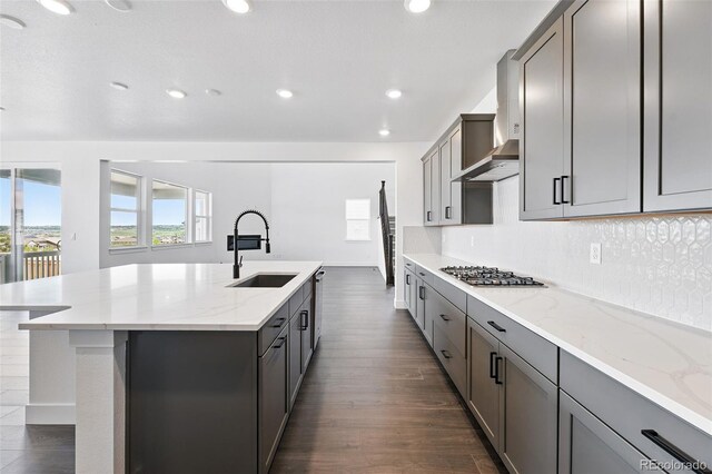16565 Black Rose Cir, Parker, CO 80134 - kitchen featuring gray cabinets, dark wood-style flooring, an island with sink, and recessed lighting