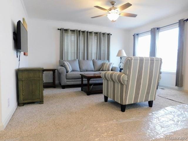 living room with ceiling fan