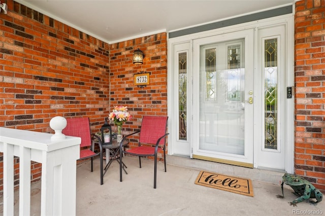 8732 W Arbor Ave, Littleton, CO 80123 - entrance to property featuring brick siding and covered porch