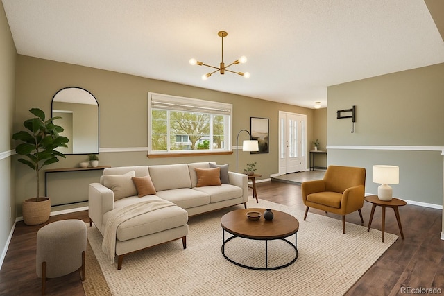 8732 W Arbor Ave, Littleton, CO 80123 - living room featuring a chandelier and wood finished floors