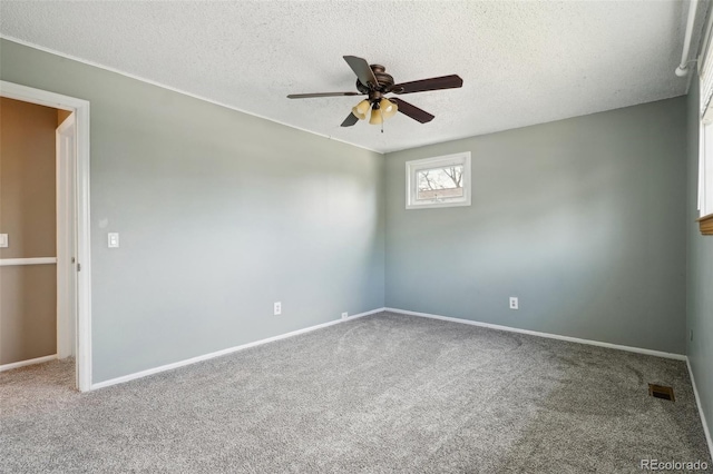 8732 W Arbor Ave, Littleton, CO 80123 - spare room with a ceiling fan, carpet floors, and a textured ceiling
