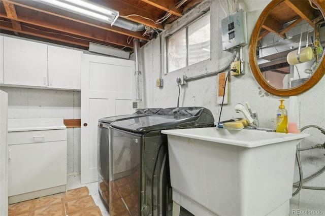 8732 W Arbor Ave, Littleton, CO 80123 - laundry room featuring washer and clothes dryer and cabinet space