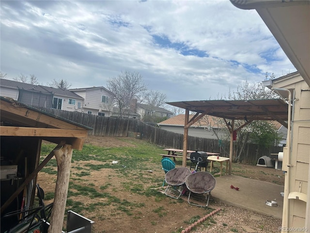 view of yard featuring a patio and a pergola