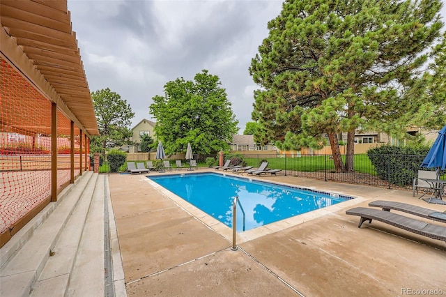 9672 W Chatfield Ave Unit C, Littleton, CO 80128 - community pool featuring a patio area
