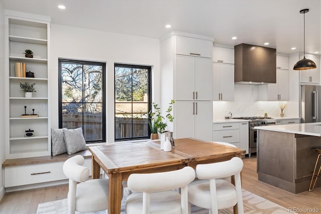 dining room featuring light hardwood / wood-style floors