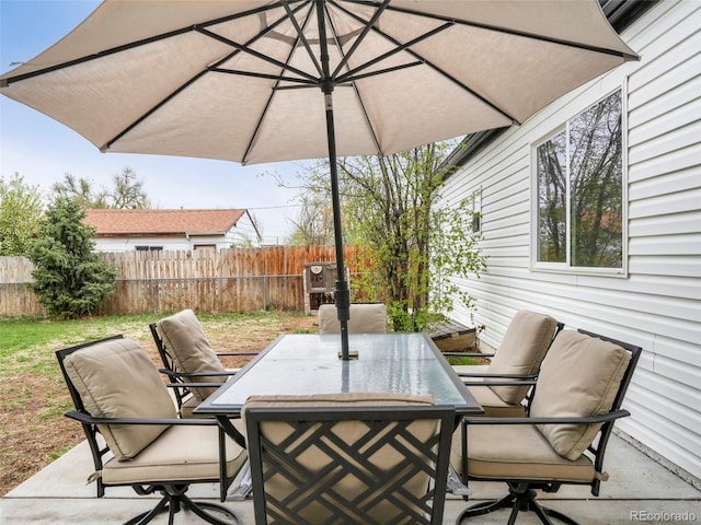 view of patio / terrace with fence and outdoor dining space
