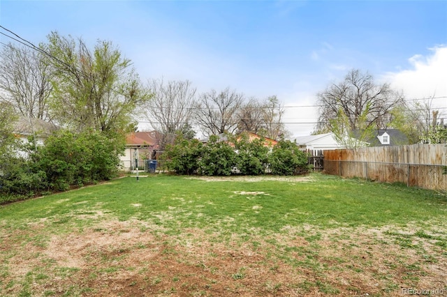 view of yard with fence