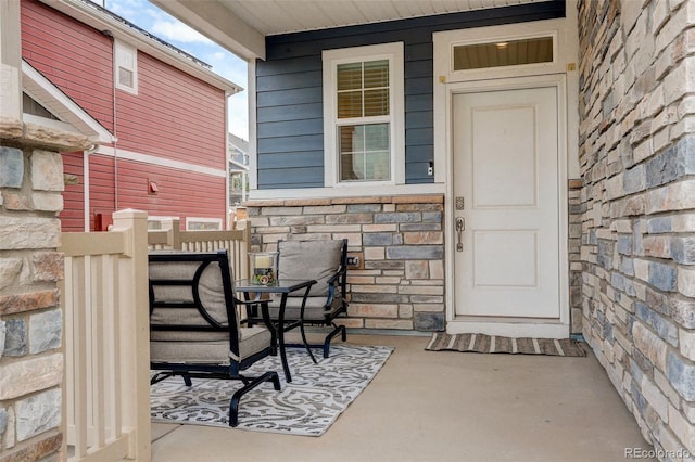 4444 N Picadilly Ct, Aurora, CO 80019 - entrance to property with stone siding and covered porch