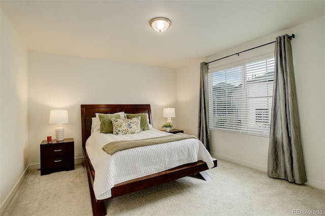 4444 N Picadilly Ct, Aurora, CO 80019 - bedroom featuring light colored carpet and baseboards