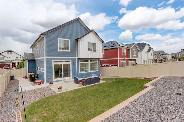 4444 N Picadilly Ct, Aurora, CO 80019 - rear view of property with a patio, a residential view, board and batten siding, and an outdoor hangout area