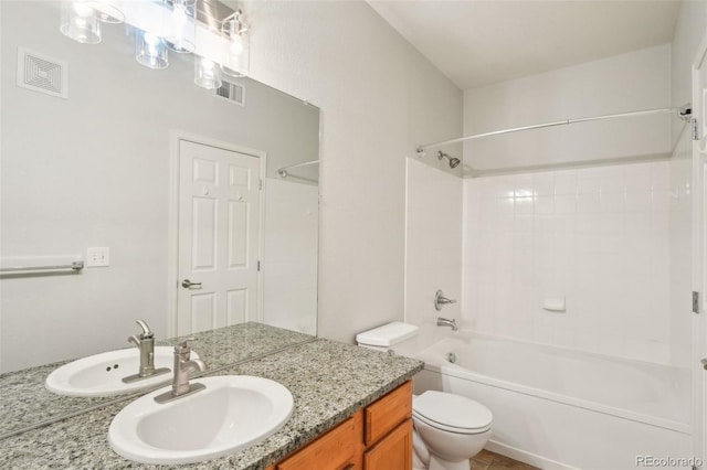 full bath featuring vanity, toilet, visible vents, and shower / bath combination