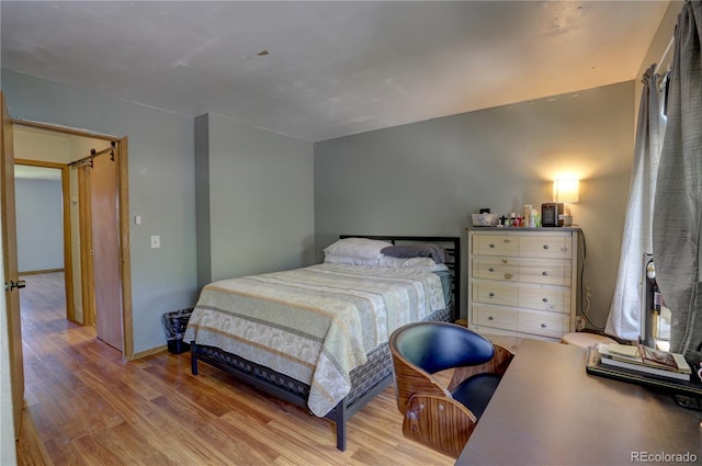 9771 W Cornell Pl, Lakewood, CO 80227 - bedroom featuring wood finished floors