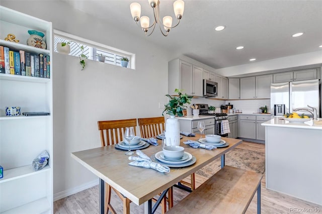 11051 Linley Way, Colorado Springs, CO 80908 - dining space with healthy amount of natural light, recessed lighting, light wood finished floors, and a chandelier