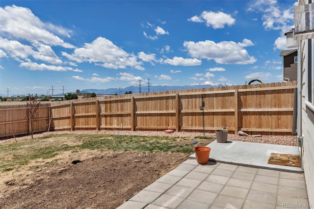 11051 Linley Way, Colorado Springs, CO 80908 - fenced backyard featuring a patio and a mountain view