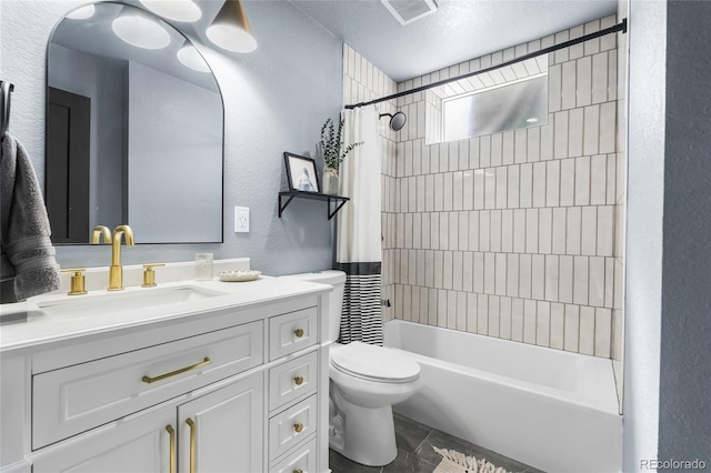 full bath with shower / tub combo, vanity, a textured ceiling, toilet, and visible vents