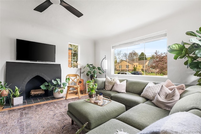living room featuring a ceiling fan