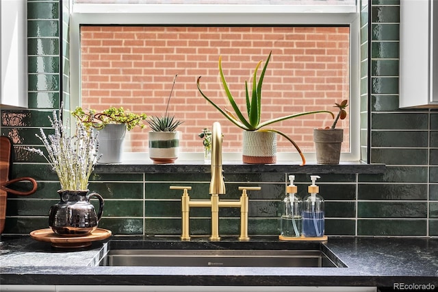 room details with a sink and decorative backsplash