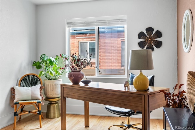 home office featuring light wood finished floors