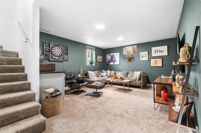 living room featuring visible vents, recessed lighting, carpet, and stairs