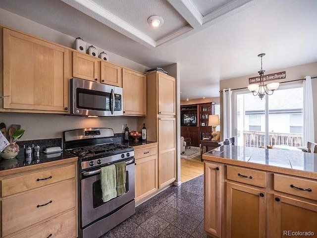 7053 Leopard Dr, Littleton, CO 80124 - kitchen with appliances with stainless steel finishes, light brown cabinets, granite tiled floors, a chandelier, and pendant lighting