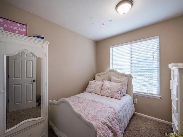 7053 Leopard Dr, Littleton, CO 80124 - carpeted bedroom with multiple windows