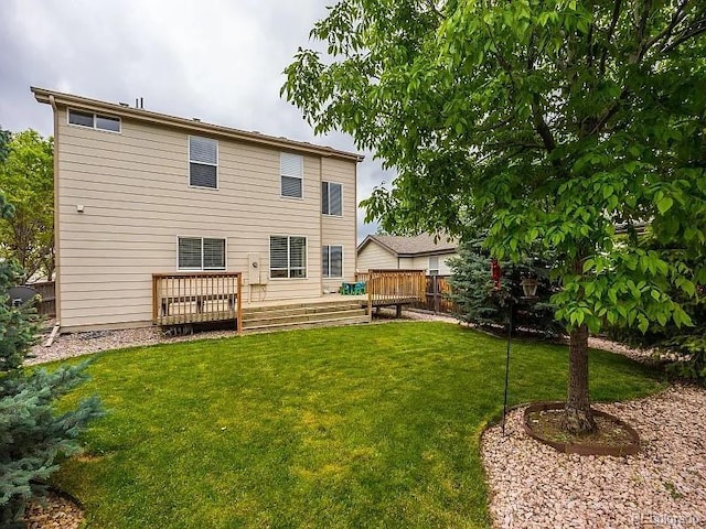7053 Leopard Dr, Littleton, CO 80124 - rear view of property featuring a deck