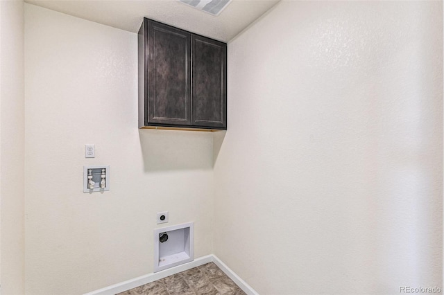 21761 E 7th Ave, Aurora, CO 80018 - clothes washing area with electric dryer hookup, hookup for a washing machine, cabinet space, and baseboards
