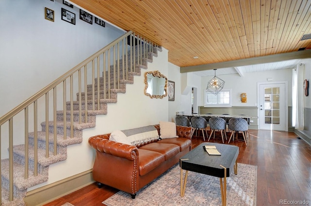129 Lang St, Twin Lakes, CO 81251 - living room featuring stairway, wood-type flooring, a wooden ceiling with exposed beams, and a chandelier