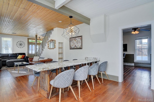129 Lang St, Twin Lakes, CO 81251 - dining area featuring stairway, dark wood-style flooring, wooden ceiling, baseboard heating, and a chandelier