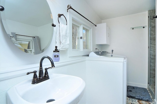 129 Lang St, Twin Lakes, CO 81251 - bathroom featuring washer / clothes dryer and a shower