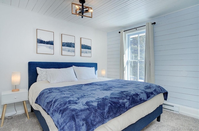 129 Lang St, Twin Lakes, CO 81251 - bedroom featuring carpet floors, a baseboard heating unit, wooden ceiling, and wooden walls