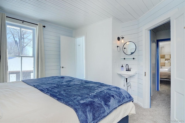 129 Lang St, Twin Lakes, CO 81251 - bedroom featuring carpet floors, wood walls, and wooden ceiling